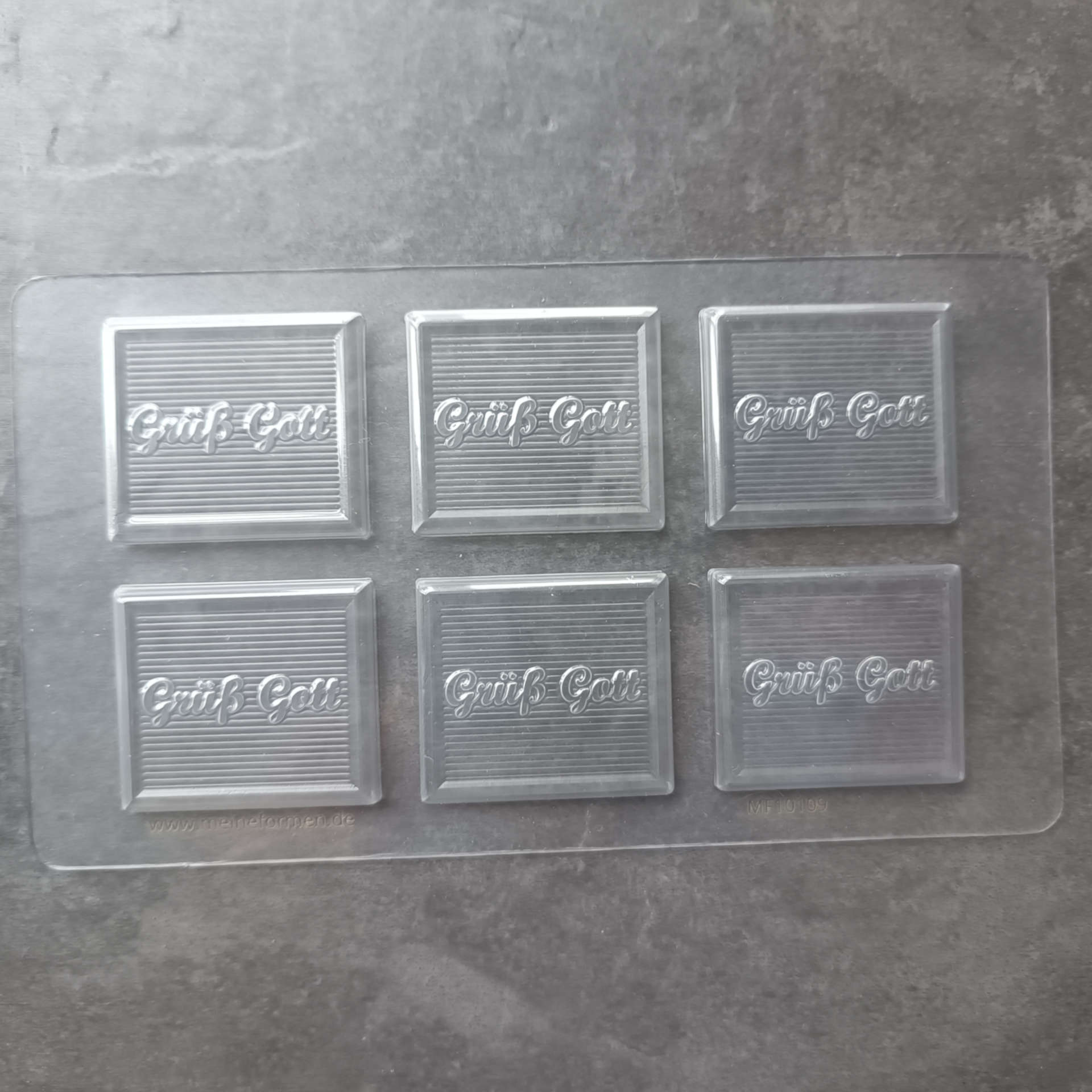 Mini chocolate tablet mould with the German inscription ‘Grüß Gott’