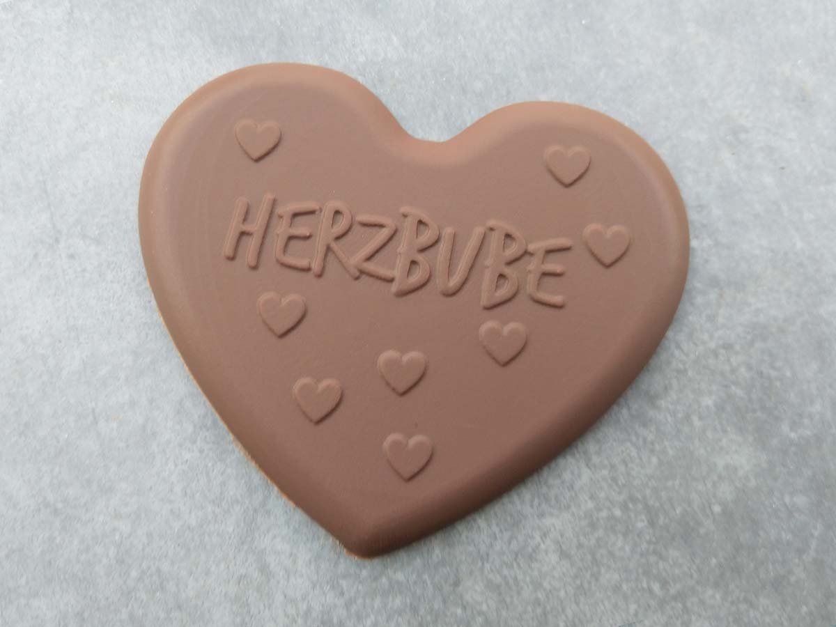 Schokoladen Herz mit der Aufschrift: "Herzbube"