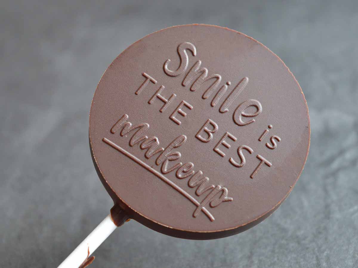 Lolly mit dem Spruch "Smile is the best makeup"