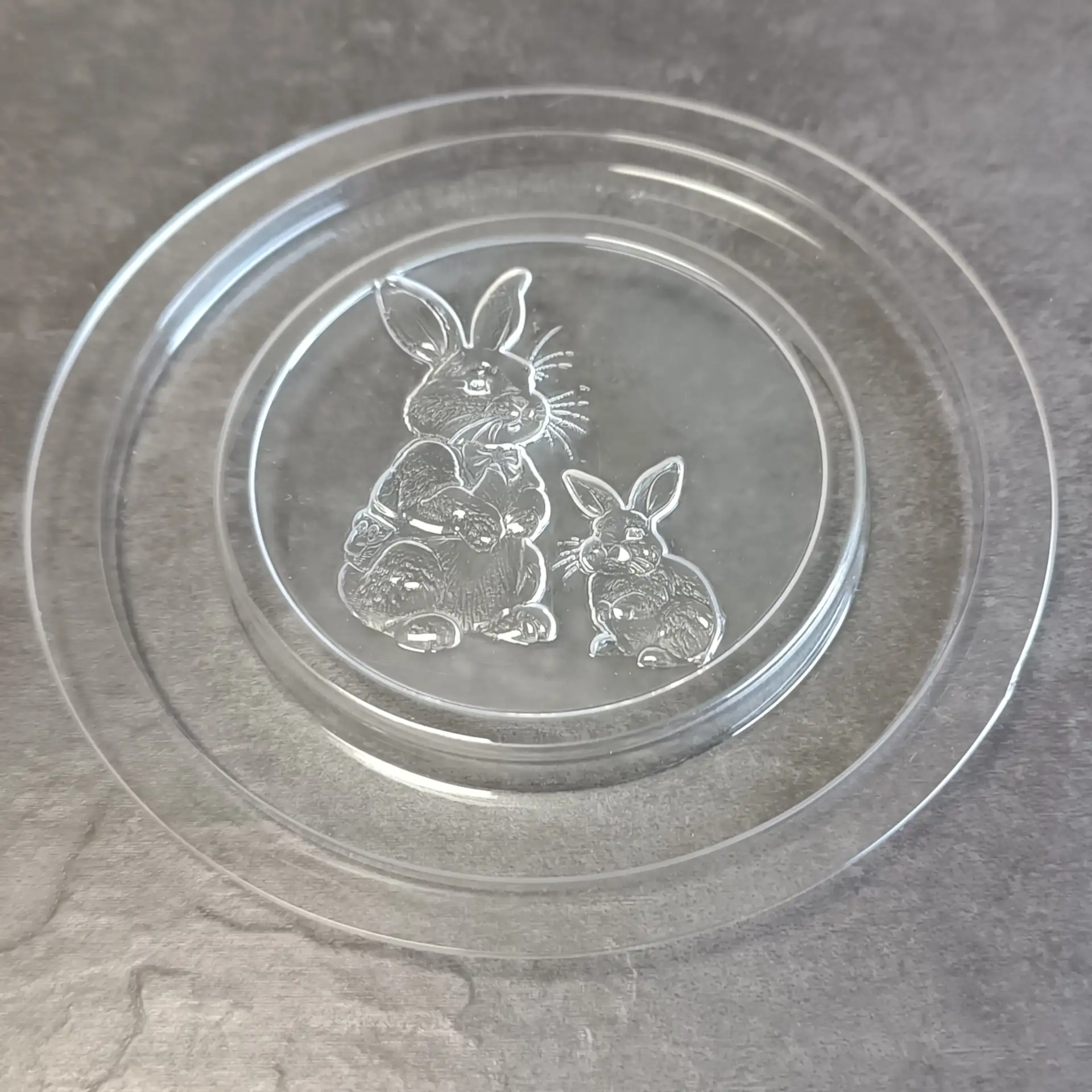 Chocolate mould for chocolate coins with a rabbit and child