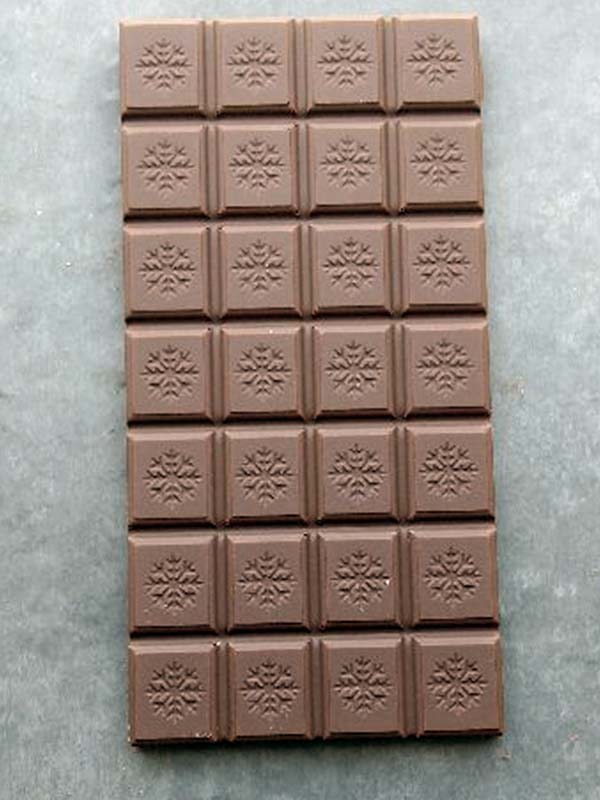 Chocolate tablet with snowflakes